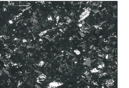 Fine grains of melilite, 200x, a) 1N b) XN Sk³ad chemiczny melilitów przyk³adowe analizy Chemical composition of melilite examples TABELA 3 TABLE 3 Sk³adnik Numer analizy/ numer warstwy 1/1 2/2 3/3