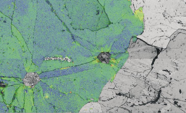 Deformation map Deformation of the garnet around the coesite/quartz inclusions The attempted change from coesite to quartz has tried to expand the inclusion, thereby causing radial cracks and