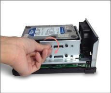 Secure each hard disk with the screws provided as shown in the