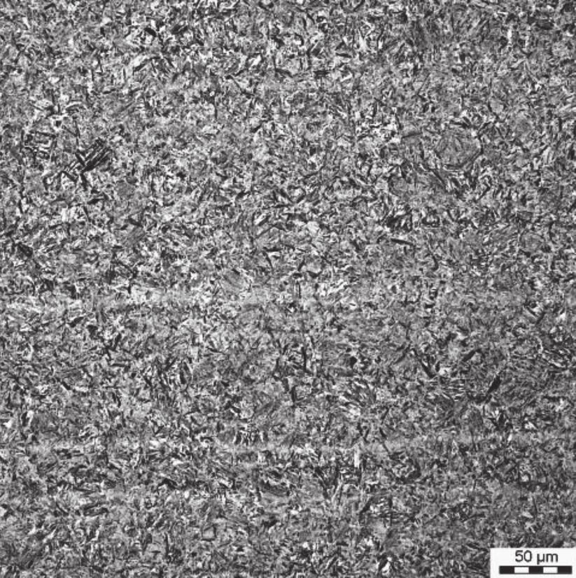 Microstructure of the 600 commercial wearresistant steel after abrasive test, light microscope: centre of specimen, area of wear resistance examination charakterystyczne obszary na grubości próbek: