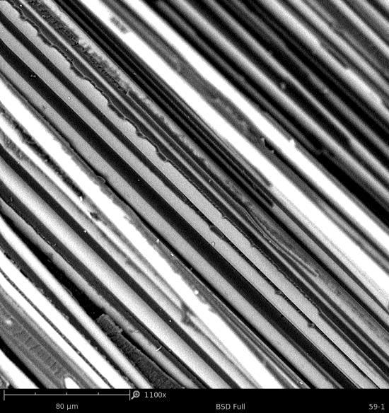 Mikrofotografie powierzchni przełomów złącz zakładkowych z grupy AlG [±45]