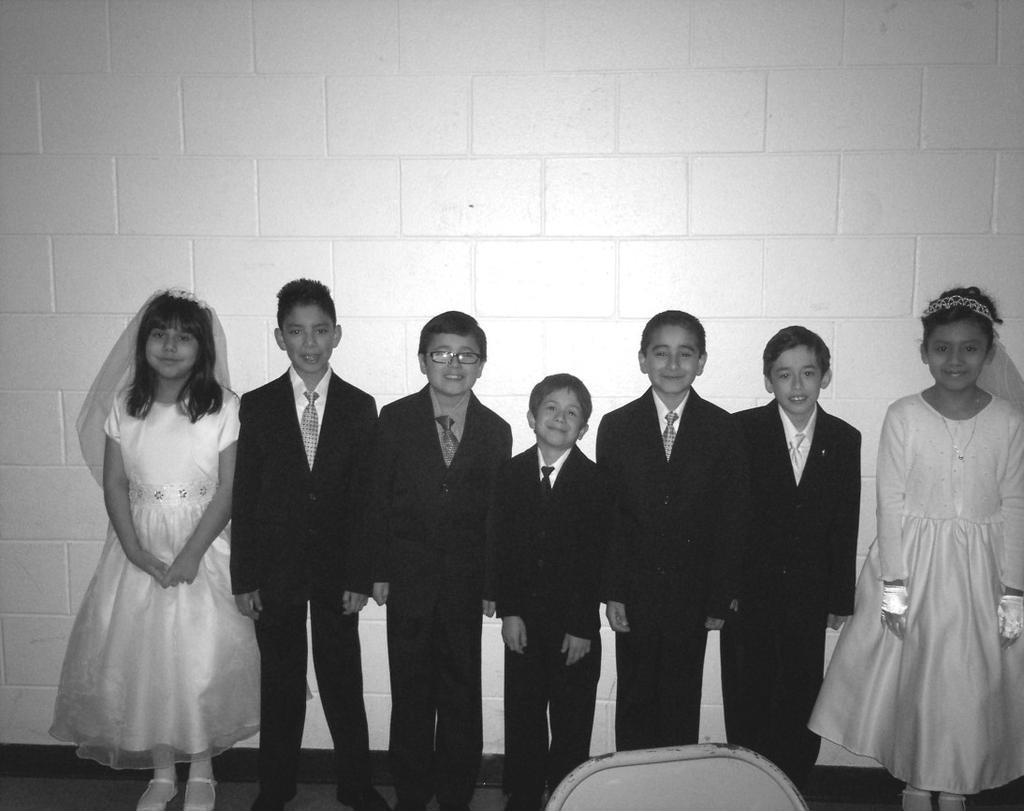 SCHOOL NEWS Father Toni and Father Emil welcomed the children of St. Bruno School and Religious Education to receive their First Holy Communion on May 7th.