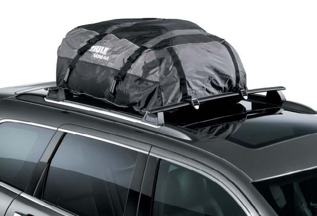 TORBA TRANSPORTOWA Z NYLONU ROOF TRANSPORT BAG Wykonany z wodoodpornego czarnego winylu. Z paskami mocującymi. Do zamontowania na belkach poprzecznych. Black weatherproof vinyl, 4 tie down straps.