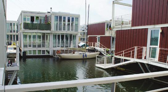 il. 15 il. 16 Dzielnica kanałów Sluseholmen w Kopehadze / Canal district Sluseholmen in Copenhagen il. 12. Kanał wodny z architekturą kwartałów mieszkalnych sztucznych wysp. Fot.