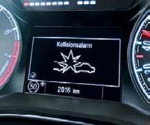 . Układ ostrzegania przed kolizją (FCA). W przypadku zbyt szybkiego zbliżania się do wolniej jadącego pojazdu, alarmuje sygnałem wizualnym i dźwiękowym.