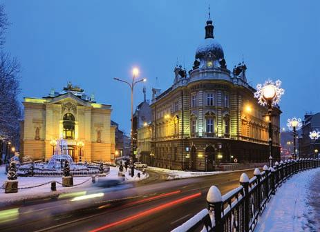 Budynek Teatru Polskiego (1890) przy ul. 1 Maja 1 w stylu palladiańsko-klasycyzującego historyzmu, z posągami Apollina oraz muz Melpomeny i Talii na fasadzie.
