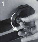[2] Przesuwać bramę ręcznie, aż do ponownego zablokowania zespołu napędowego. [3] Obrócić klucz o ćwierć obrotu w prawo.