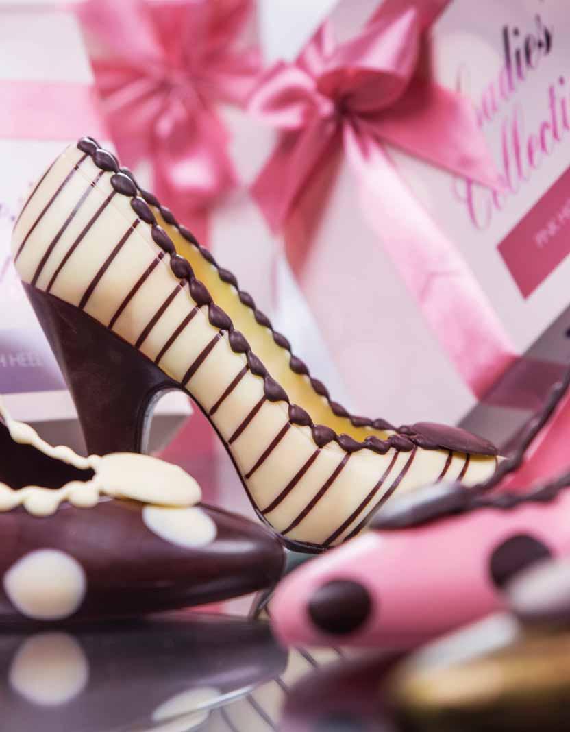 czekolady, zapakowany jest w niezwykle kobiece różowo-białe opakowanie