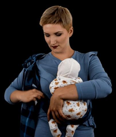 Put your baby in the sling, supporting the baby all the time. Adjust baby position and put baby s arms inside the sling.