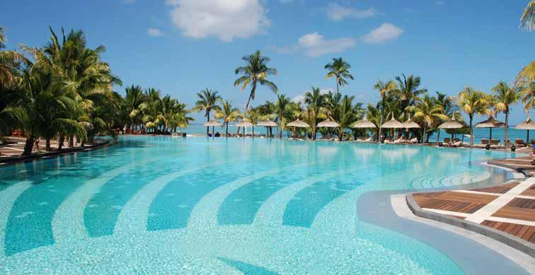 WYPOCZYNEK MAURITIUS HOTEL DINAROBIN ***** POŁOŻENIE: Zlokalizowany na najbardziej malowniczym odcinku wybrzeża Mauritiusa z widowiskową górą La Morne stanowiącą dramatyczne tło.