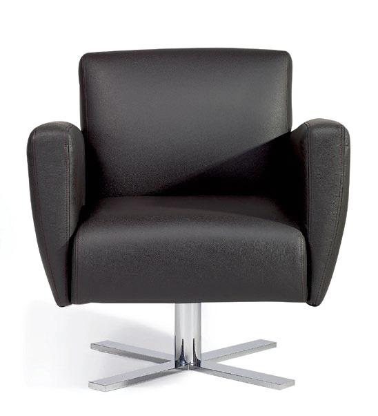 A small armchair with a characteristic Niewielkich gabarytów fotel stainless steel leg.