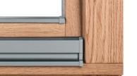 Okapniki w oknach drewnianych pełnią funkcję zabezpieczającą ramy