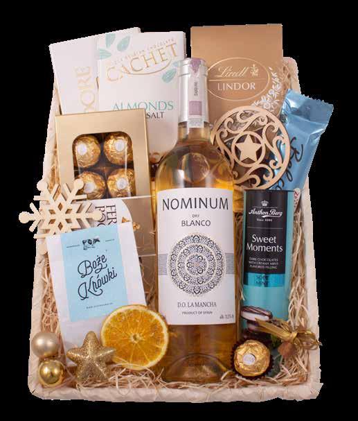 06 Gwiaździsta Noc zawartość: Nominium Dry Blanco 0,75L Ferrero Rocher praliny 100g Lindt praliny Lindor mieszane 100g