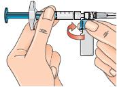 16 - Następnie uchwycić niebieski łącznik fiolki z zamocowaną fiolką i odłączyć go od strzykawki ruchem skręcającym i odciągnąć go do dołu, od strzykawki.