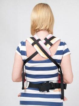 While holding your child with your left arm put the right shoulder strap over your right shoulder.