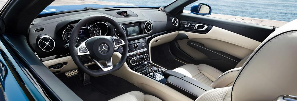 Sportowa przestrzeń w najbardziej wyszukanej formie. Kokpit modelu Mercedes-Benz SL urzeka wyjątkową atmosferą wnętrza, wysokim komfortem siedzenia i wręcz kipi wytwornością.
