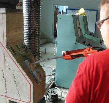 Strengthening of specimen D-II a) drilling the hole throught anchoring plate, b)