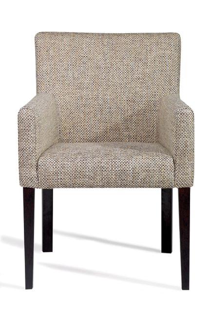 Ponadczasowy szyk i komfort to główne cechy tego tapicerowanego krzesła.