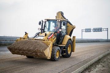 Zawory podziału wydatku aktywnie sterują przepływem oleju dla poszczególnych funkcji maszyny.