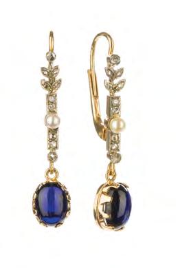 1 Pierścionek z szafirem pocz. XX w. platyna pr. ~ 0,950, 1 szafir w szlifie kaboszon ~ 1,00 ct, 16 diamentów w szlifach 8/8 ł.