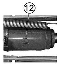 Kółka tylne skrętne; 9. Dźwignia podnośnika / klucz do kół; 10. Zawór hydrauliczny; 11. Zawór bezpieczeństwa; 12.