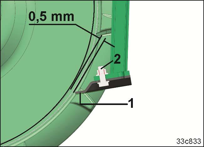 Nastawy 8.5.3 Pierścieniowy wał trapezowy TRW 1. Odłączyć siewnik. 2. Unieść maszynę uprawową za pomocą hydrauliki ciągnika na tyle, aby wał oderwał się od podłoża. 3.
