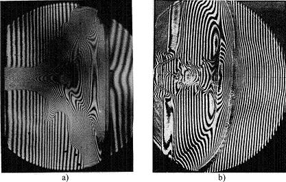 2. Fizyka układu Plasma-Focus Rys. 2.22. Przykładowe interferogramy obrazujące: a) spokojną fazę ogniska (quiet phase), b) niestabilną fazę ogniska (niestabilność m = 0) [Rys.