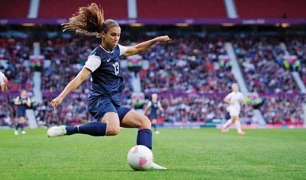 Megan Rapinoe scored twice and Olympic veteran Abby Wambach converted a penalty kick in the 80th minute to set up overtime.