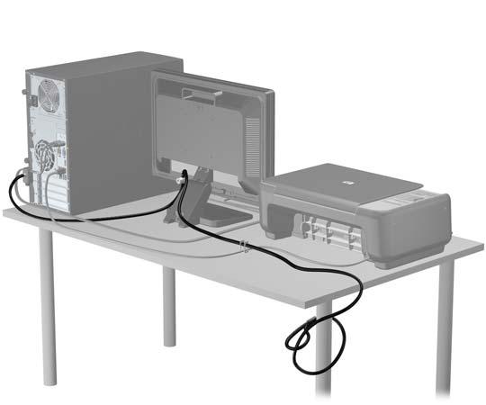 Rysunek 2-41 Zabezpieczona stacja robocza Zabezpieczenie pokrywy przedniej Osłonę przednią można przymocować, używając śruby zabezpieczającej dostarczanej przez firmę HP.