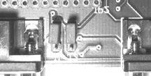 4 (włączoną pomiędzy masę i wyprowadzenie numer 3 modułu LCD). Elementem interfejsu użytkownika są także diody LED (D1...D8) dołączone poprzez bufor IC2 do portów P0.23...P0.16 mikrokontrolera IC6.