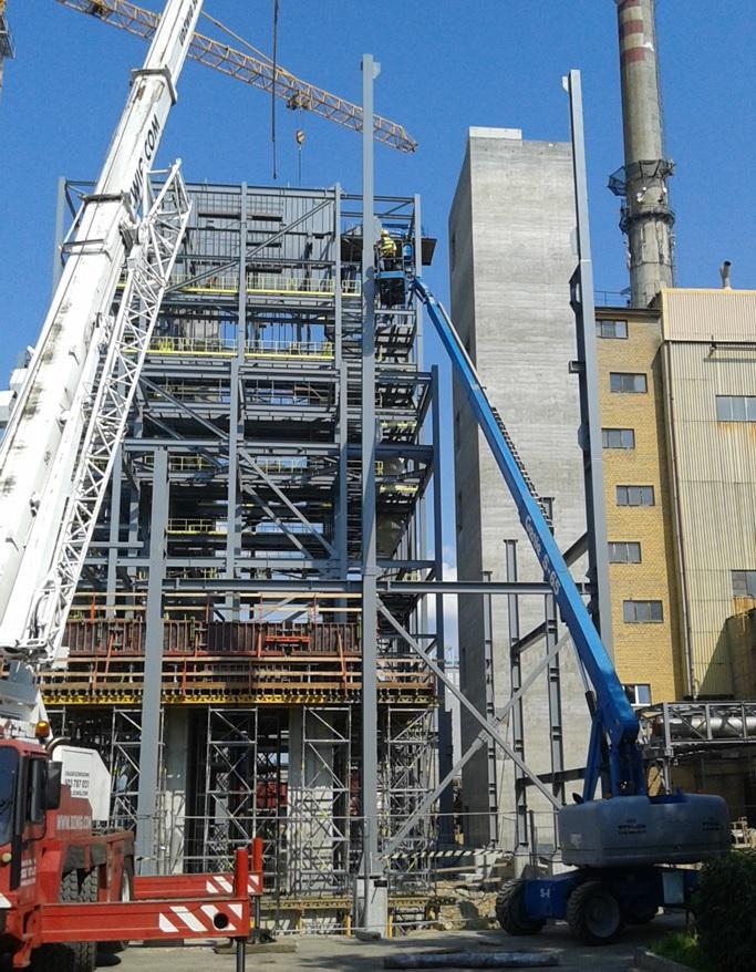 ZREALIZOWANE PROJEKTY / OUR PROJECTS Kompleksowe wykonanie i montaż konstrukcji stalowej budynku maszynowni z nawą odgazowywaczy na obiekcje ZW Tychy TAURON Ciepło S.A. BLOK BC 50 - ok 1000 ton.