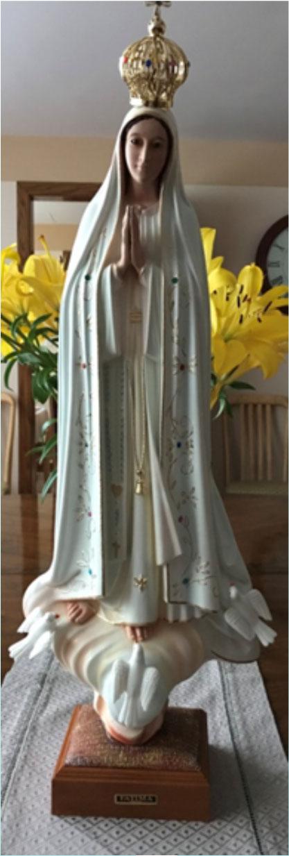 Twenty-Eighth Sunday in Ordinary Time Page Five The statue of our Lady of Fatima of St. Priscilla parish, visits the parishioners homes and families.