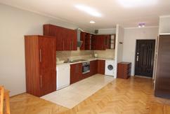 1-POKOJOWE 40,50m 2 GRZEGÓRZKI ul. Nullo przedpokój, otwarta kuchnia, pokój sypialniany, łazienka z wc, balkon, piwnica.