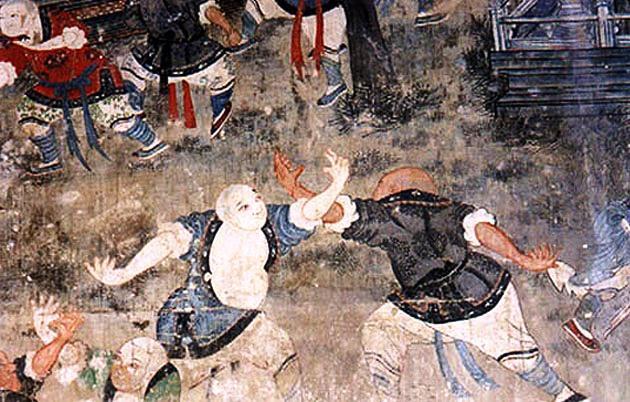 7 Fot. 10. Fragment naściennego obrazu w Pawilonie Białej Szaty w klasztorze Shaolin; widoczni na nim mnisi walczą z sobą używając technik otwartych dłoni (chin. Feng Shou).