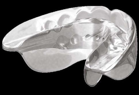 Prowadnik do wyrzynających się zębów i korekcji przechyleń II. Korekty szkieletowe żuchwy III.
