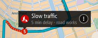 Uwaga: jeśli TomTom GO PREMIUM nie odbiera żadnych informacji drogowych, poniżej panelu informacji o przyjeździe widoczny będzie symbol przedstawiający ruch drogowy z krzyżykiem.
