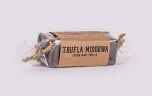 CU242 BATON TRUFLA MIODOWA 80x25x25 mm 80g Trufle Miodowe to ekskluzywne batoniki tworzone z wykorzystaniem najlepszej belgijskiej czekolady 72%.