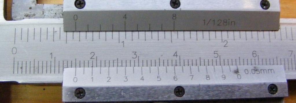 Zadanie 1. Wartość pomiaru suwmiarką wynosi 14,25 mm 15,10 mm 15,25 mm 15,45 mm Zadanie 2.