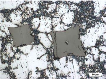 Microstructure of a pressure cast made from silumin containing chromium in the amount of: a) 0.3 wt. %; b) 0.4 wt. %; c) 0.5 wt.