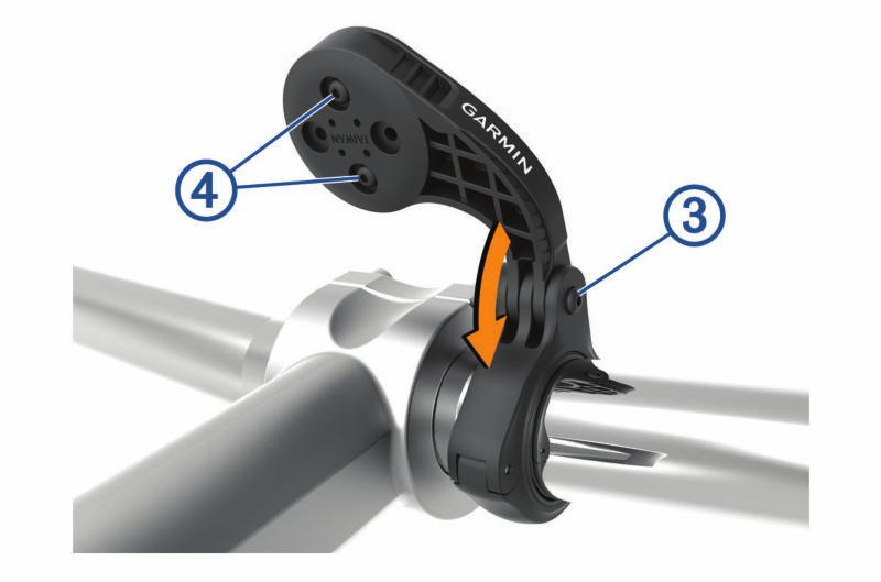 1 Do zamontowania urządzenia Edge wybierz taką pozycję, która nie będzie przeszkadzała w bezpiecznej jeździe rowerem. 2 Użyj klucza imbusowego 3 mm, aby wykręcić śrubę z zacisku na kierownicę.