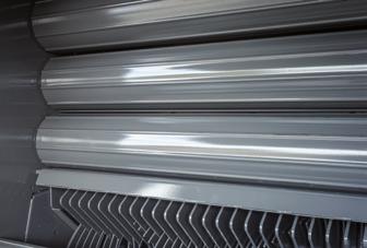 Komora prasowania Komora prasowania składa się z 18 walców PowerGrip, co zapewnia skuteczny kontakt z materiałem oraz szybszą rotację beli przekładającą się na wyższe