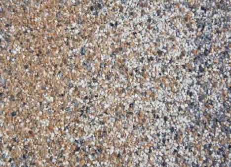 szlachetnych (granit, kwarc, marmur, bazalt), uwypukloną przez impregnację.