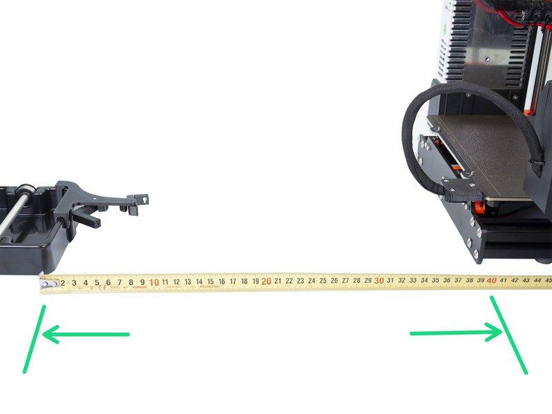 Step 9 Rozmieszczenie uchwytów na szpule Umieść uchwyty na szpule co najmniej 40 cm (15.75 cala) za drukarką.