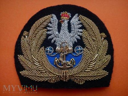 emblemat oficerski z orłem Marynark iwojennejii RP emblemat oficerski z orłem Marynark iwojennejii RP Bardzo dobry Replika emblematu oficerskiego II RP.Podobne wykonywane były w latach 30- tych.