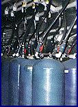 The row of photoreactors (top picture)and the 500 gallon storage tank