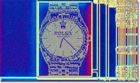 Ancient Egyptian God Anubis Pac-Man While examining the Silicon Graphics MIPS R12000 microprocessor, we found a pair of Egyptian gods that appear to be guarding mask alignment targets on the chip.