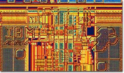 This creature is about 100 microns high. We spotted this silicon Pac-Man gobbling the initials GAAS (gallium arsenide) on a TEMIC Semiconductors silicon-germanium radio frequency integrated circuit.