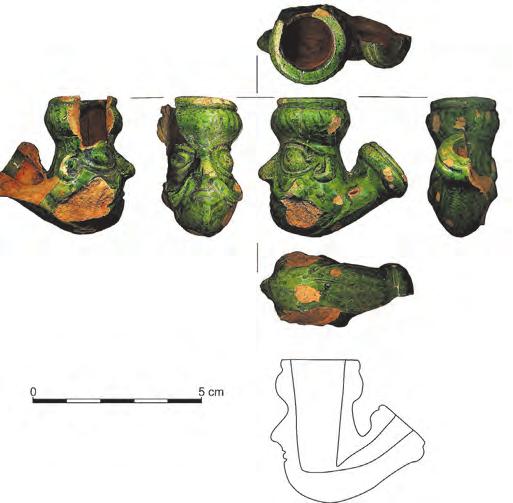 135 Ryc. 32. Antropomorficzna fajka ceramiczna w kształcie głowy Turka w turbanie z XVII w.
