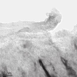 Microstructure of obtained materials: a) typical nanostructure view in Ni coating, b) periodic objects
