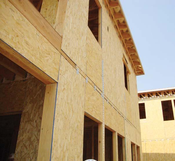 Fot. 5. Domy drewniane usztywnione poszyciem OSB. Układzie tarczowym, będzie w stanie przenieść znacznie większa obciążenia.